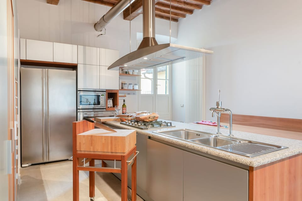 Apartment, 3 Bedrooms | Private kitchen | Full-size fridge, stovetop, dishwasher, toaster