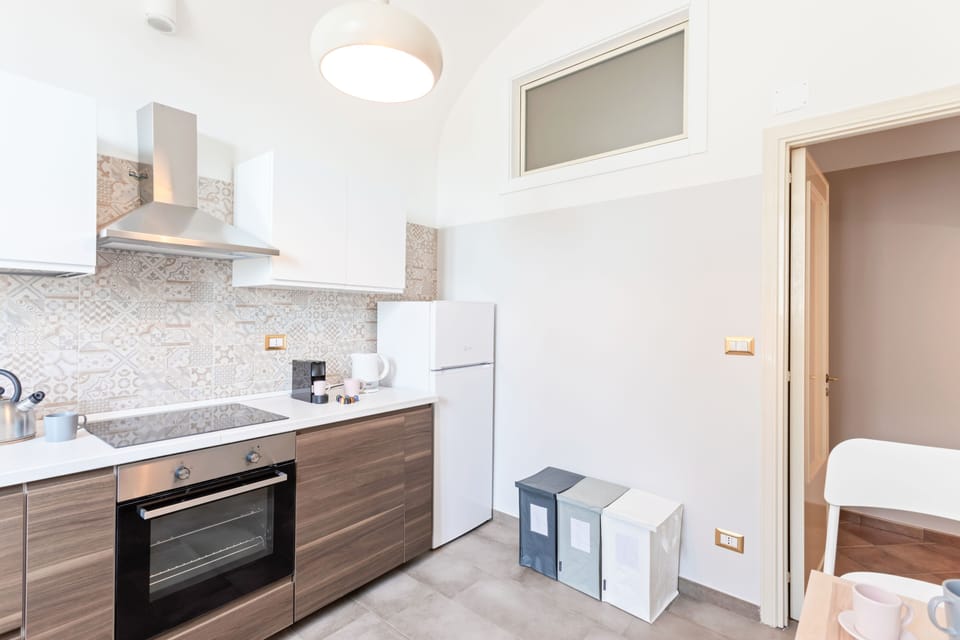 Apartment, 1 Bedroom | Private kitchen | Full-size fridge, oven, stovetop, dishwasher