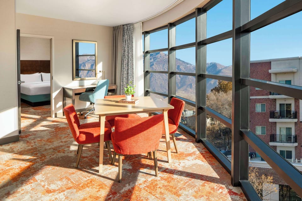 Down comforters, desk, laptop workspace, blackout drapes