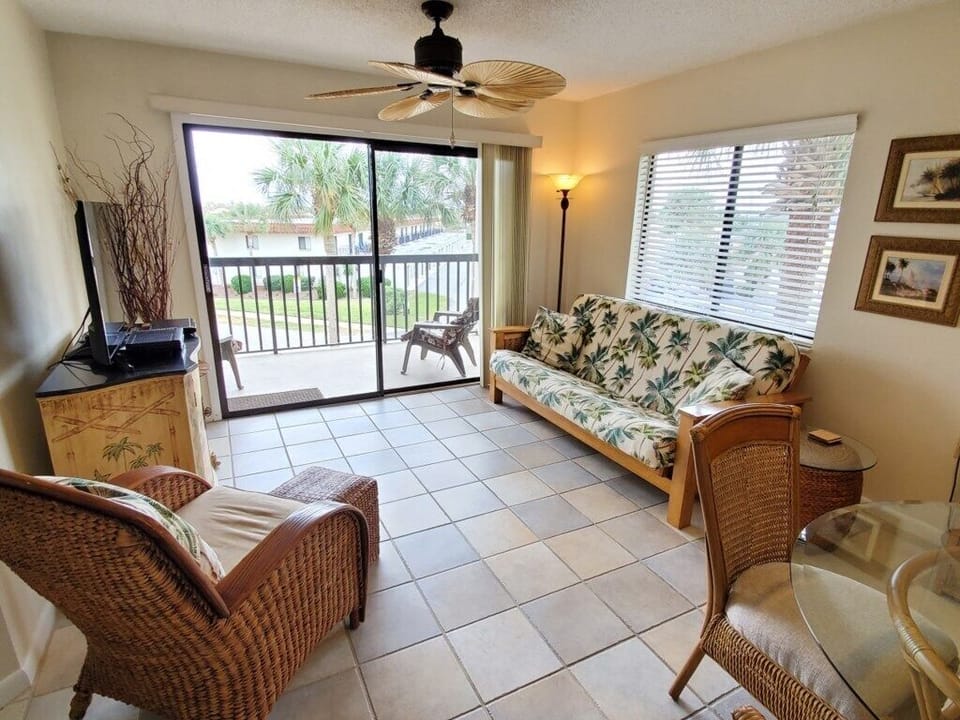 Condo, 1 Queen Bed with Sofa bed, Balcony | Living area | 42-inch TV with cable channels, DVD player