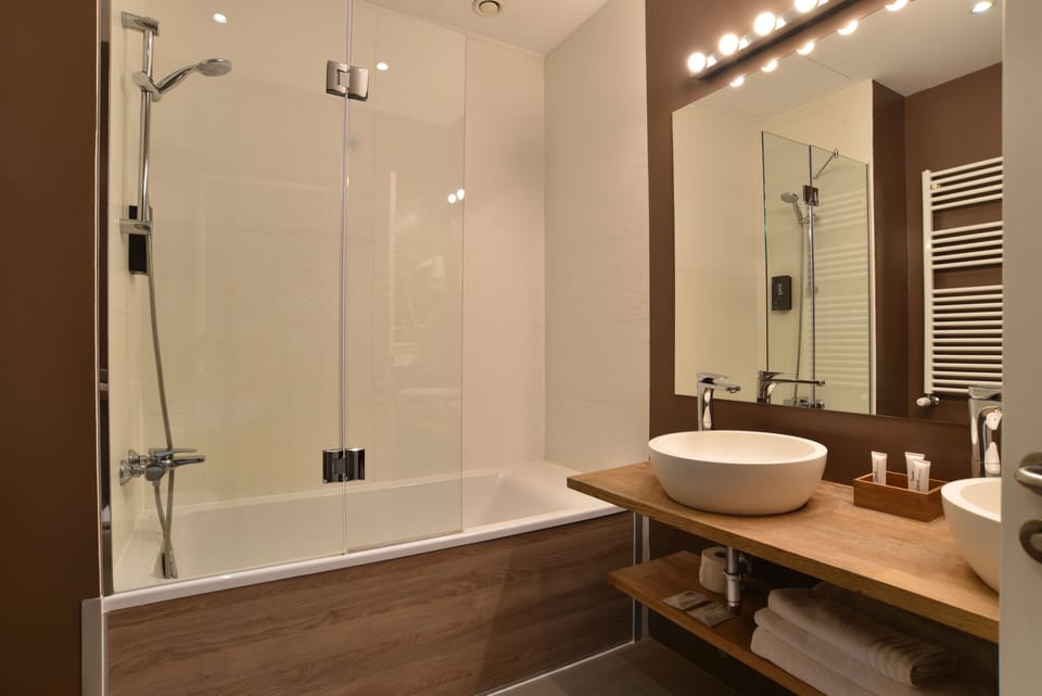 Premium Double Room | Bathroom | Designer toiletries, hair dryer, slippers, towels