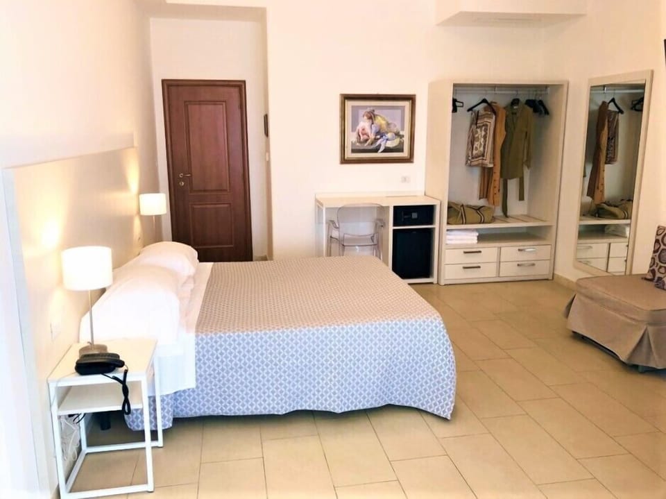 Superior Triple Room, Ocean View | Minibar, in-room safe, desk, soundproofing