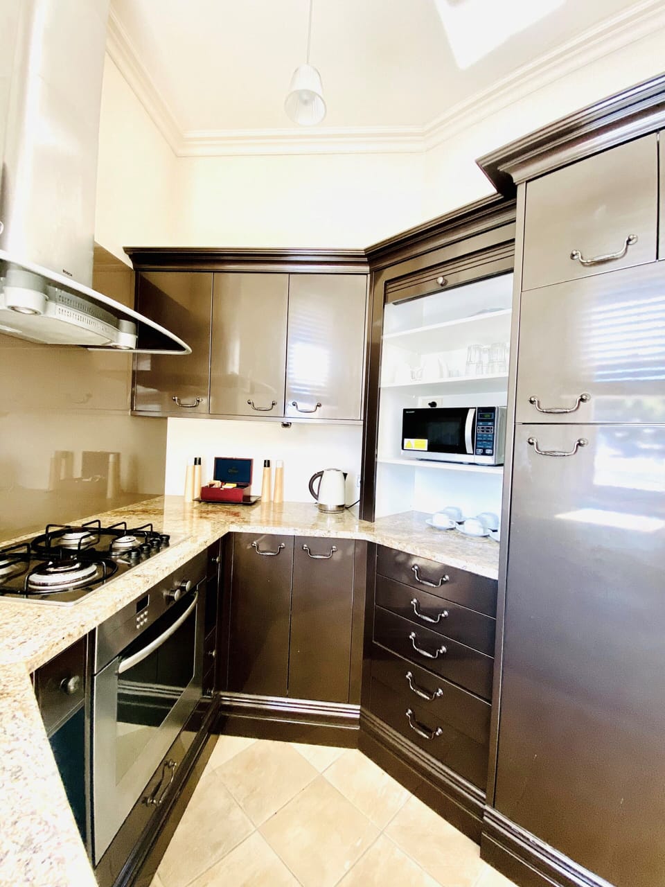 Mini-fridge, coffee/tea maker, electric kettle, highchair
