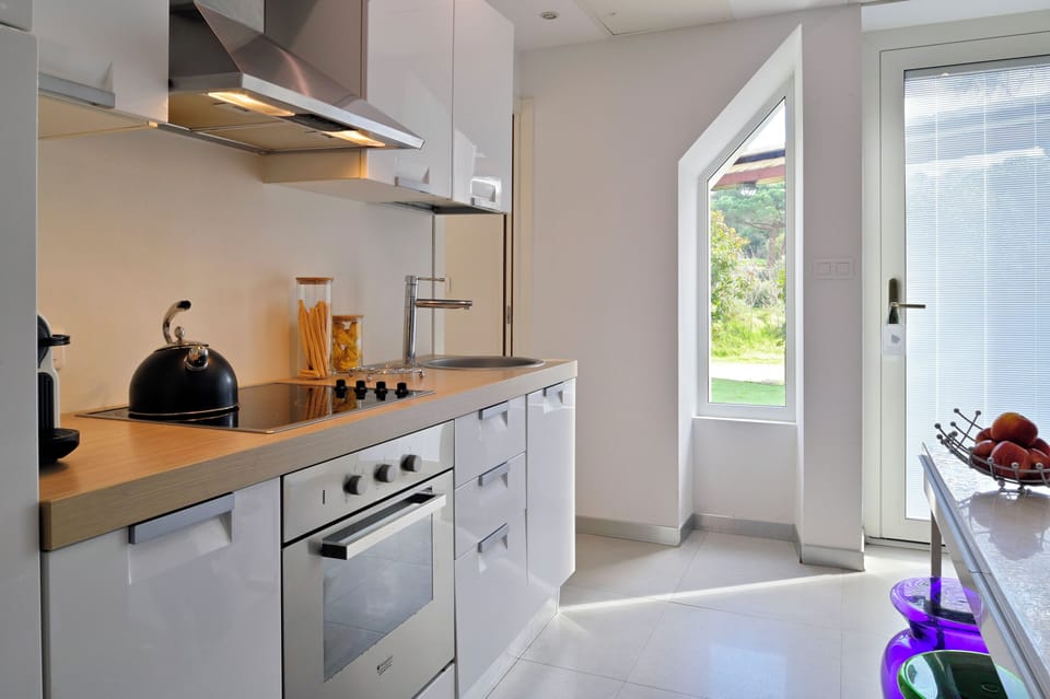 Apartment, 2 Bedrooms | Private kitchen | Fridge, espresso maker, coffee/tea maker, electric kettle
