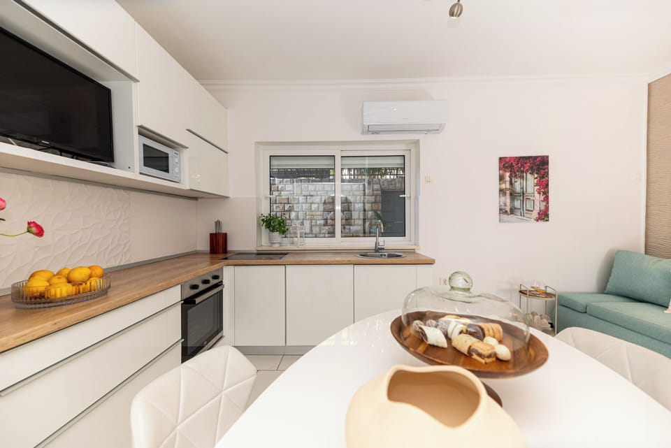Apartment, 2 Bedrooms, Smoking, Balcony | Living room | TV