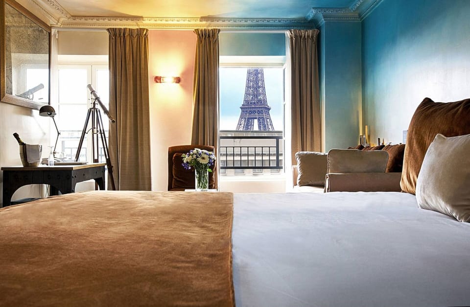 Suite (Eiffel) | Minibar, in-room safe, individually decorated, desk