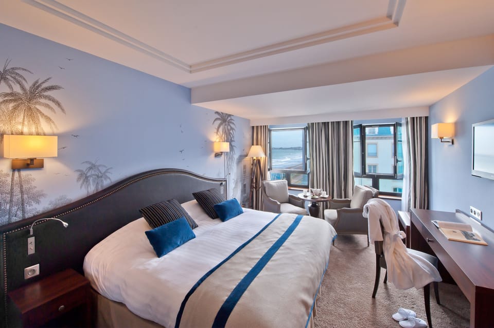 Double or Twin Room, Partial Sea View | Premium bedding, minibar, in-room safe, desk