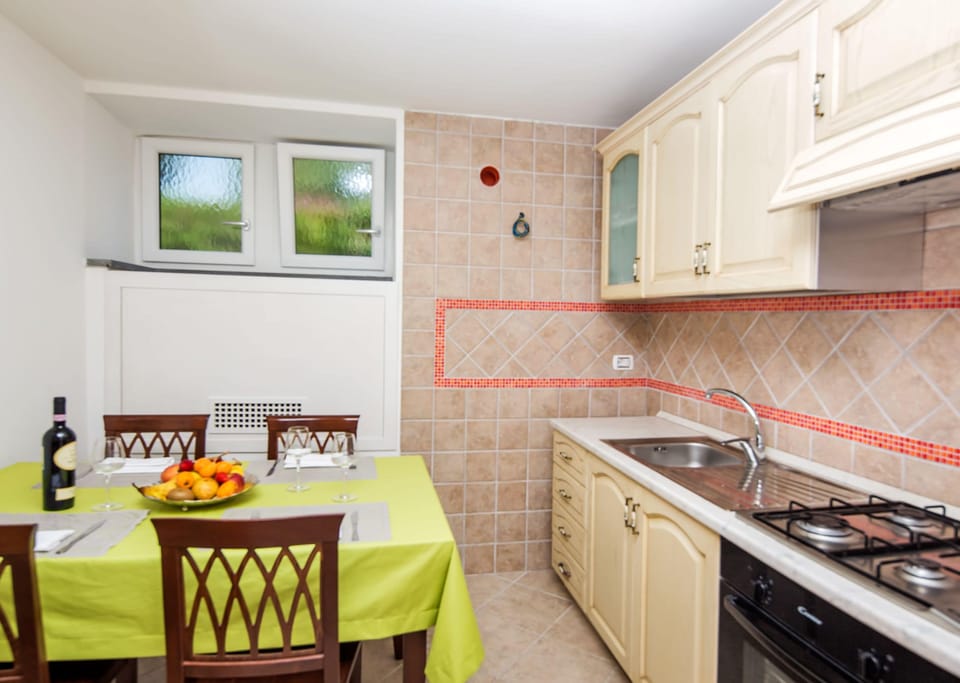 Family Apartment, 1 Bedroom, Partial Sea View | Premium bedding, minibar, in-room safe, desk