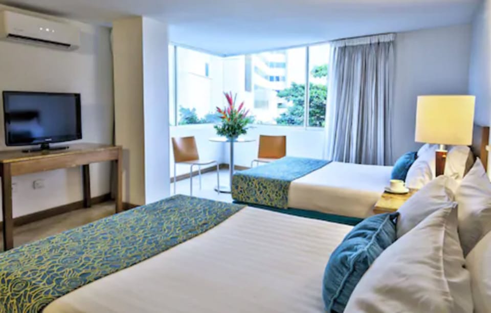 Superior Room, Partial Ocean View | Desk, blackout drapes, free WiFi, bed sheets