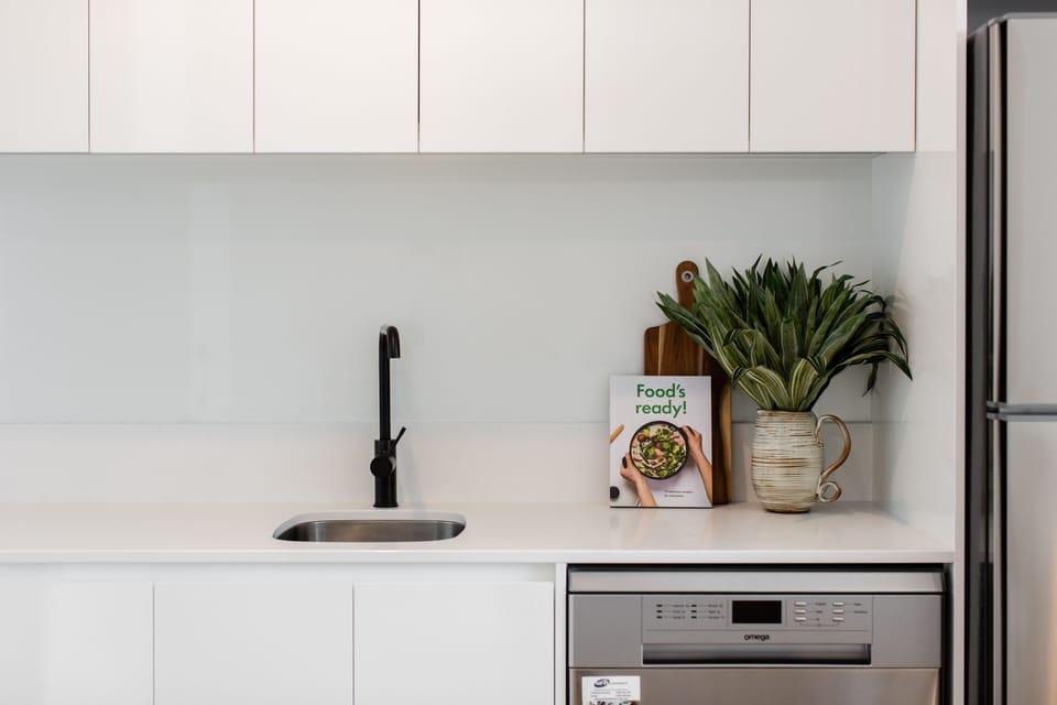 Two Bedroom Apartment With Parking | Private kitchen | Full-size fridge, microwave, oven, stovetop