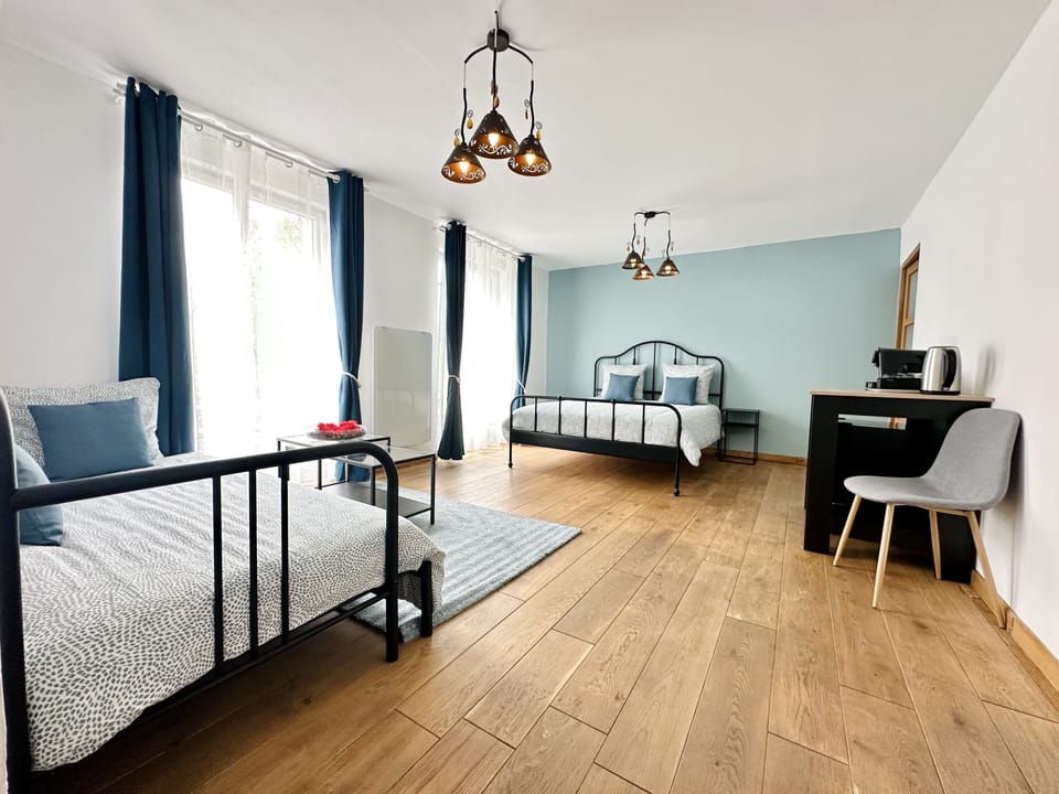 Superior Quadruple Room, 1 Bedroom, Garden View | Individually decorated, individually furnished, blackout drapes
