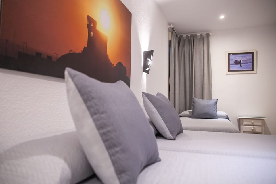Standard Triple Room, Private Bathroom | Desk, iron/ironing board (on request), WiFi (free), bed sheets