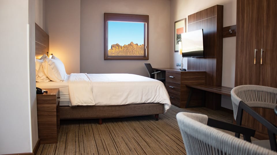 Suite, 1 King Bed (Top Floor) | Premium bedding, in-room safe, desk, blackout drapes