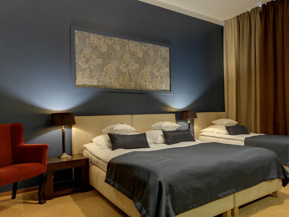 Standard Quadruple Room | Desk, blackout drapes, iron/ironing board, WiFi (free)