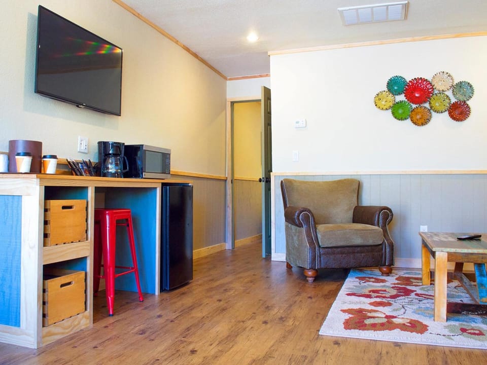 Suite, 1 Bedroom (Two Double Beds) | Living room | TV