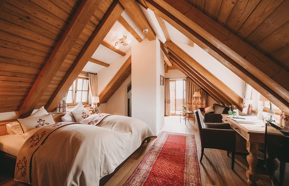 Superior Suite, Balcony, Mountain View | Premium bedding, minibar, in-room safe, individually decorated