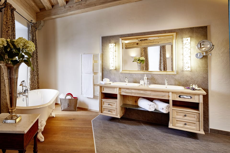 Luxury Studio Suite, Bathtub, Mountain View | Bathroom | Free toiletries, hair dryer, bathrobes, slippers