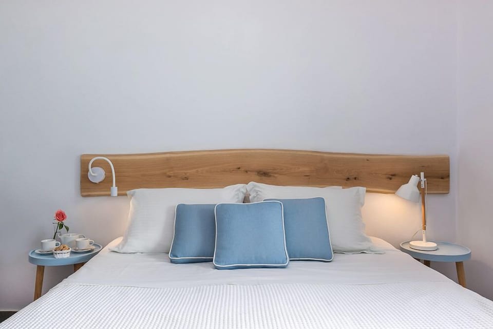 Theros Nest | Premium bedding, in-room safe, blackout drapes, iron/ironing board