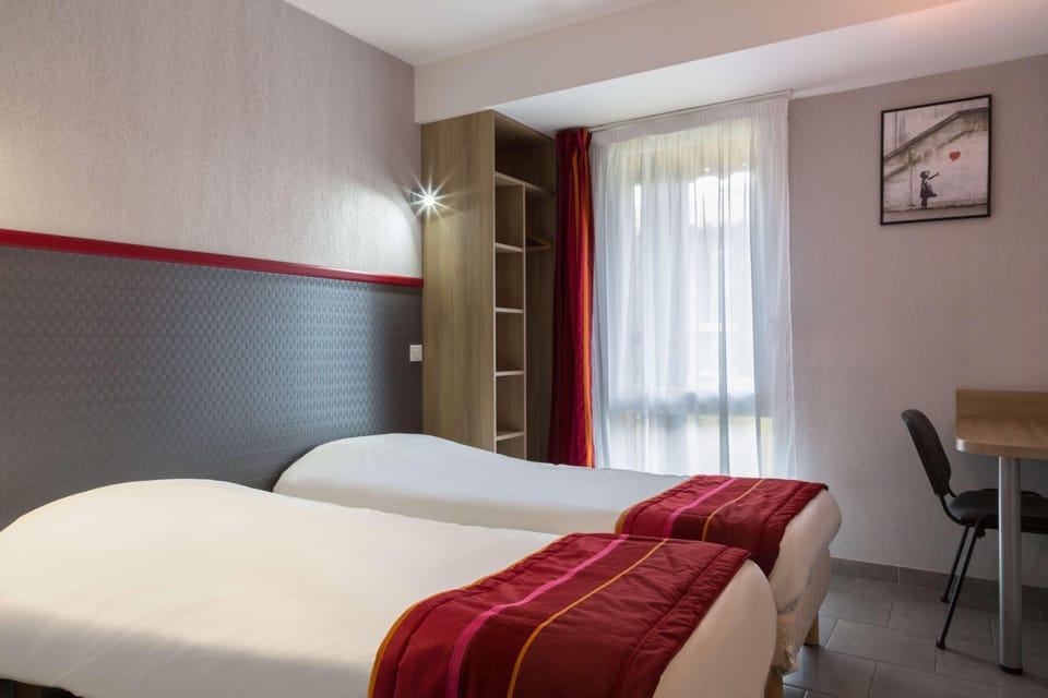 Premium bedding, blackout drapes, soundproofing, iron/ironing board