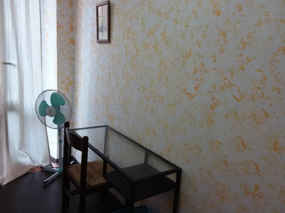 Basic Triple Room, Shared Bathroom | Room amenity