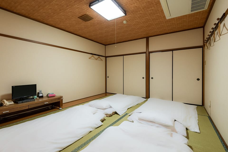 Japanese Room with Shared Bathroom - Quadruple, Smoking | Free WiFi