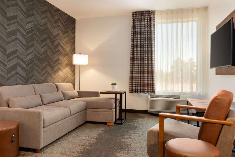 Hypo-allergenic bedding, pillowtop beds, desk, laptop workspace