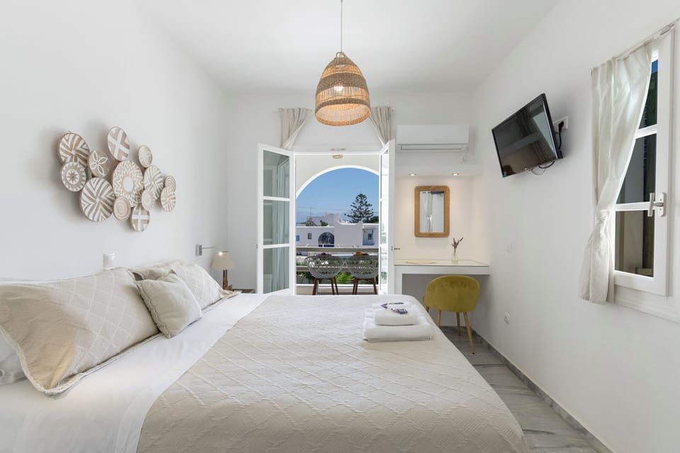Standard Room, 1 Double or 2 Twin Beds, Balcony, Partial Sea View | Egyptian cotton sheets, premium bedding, down comforters, in-room safe