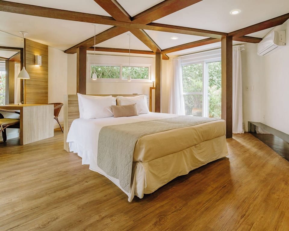 Deluxe Triple Room, Patio, Garden View | In-room safe, individually decorated, individually furnished, free WiFi