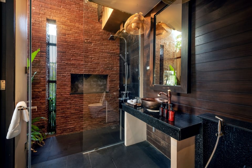 Beachfront Jacuzzi Pool Villa Two Bedroom Duplex with Lounge | Bathroom | Separate tub and shower, jetted tub, rainfall showerhead