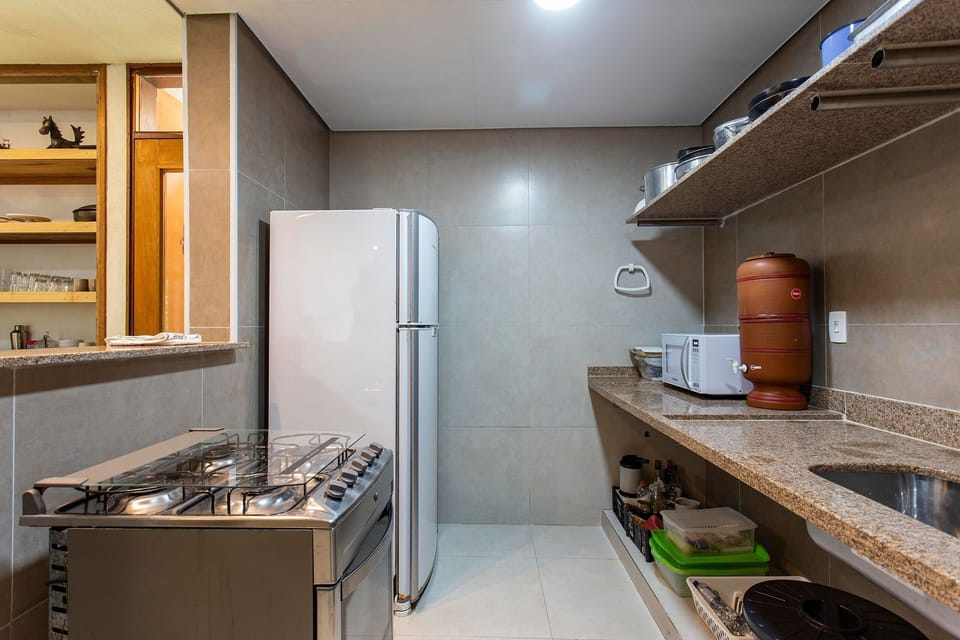 Fridge, microwave, cookware/dishes/utensils