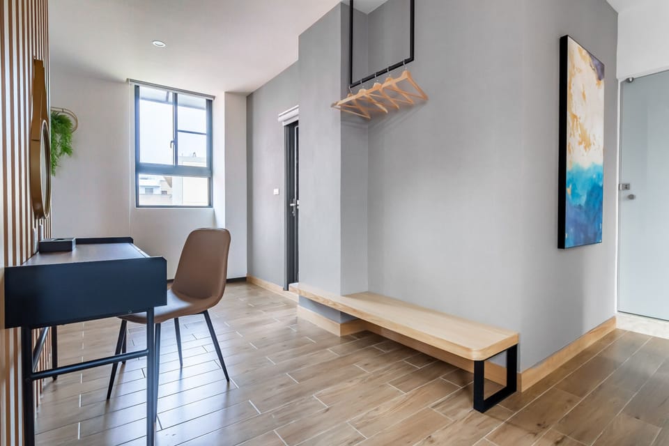 Deluxe Room, Garden View | Minibar, desk, blackout drapes, soundproofing