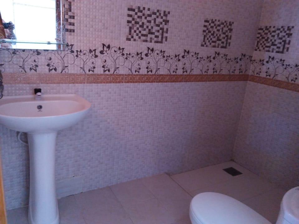 Separate tub and shower, free toiletries, hair dryer, slippers