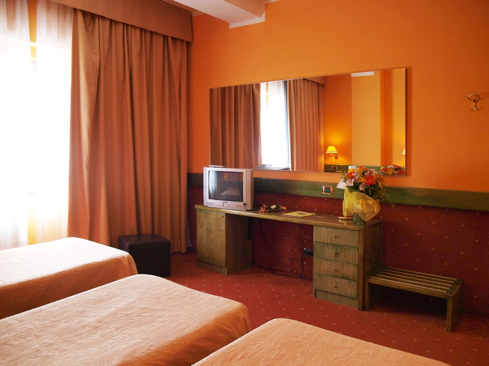 Triple Room | Minibar, in-room safe, desk, iron/ironing board (on request)