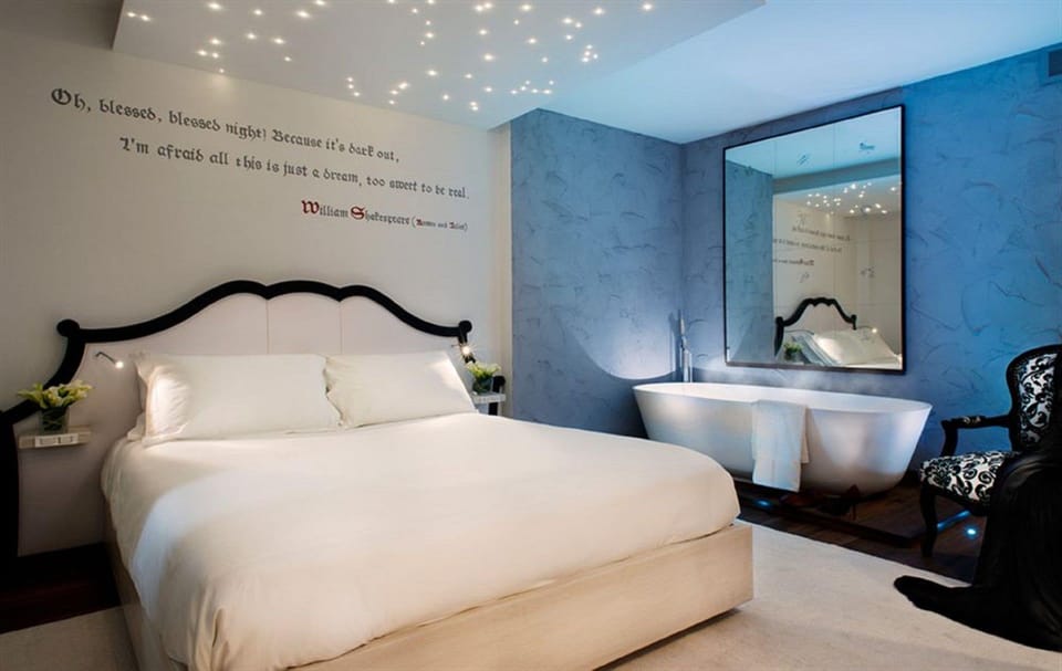 Deluxe Suite with City View | Premium bedding, in-room safe, desk, soundproofing