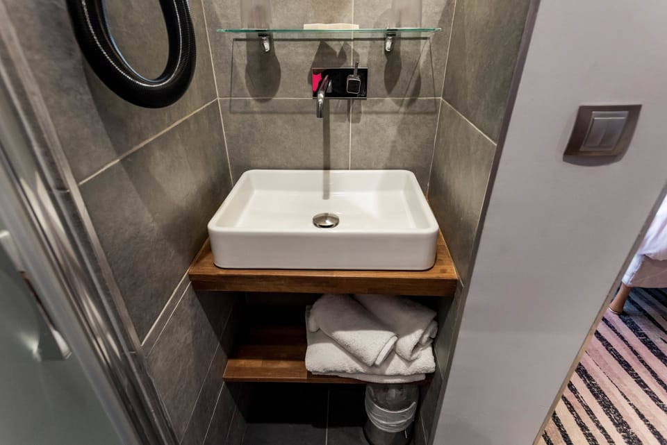 Shower, free toiletries, hair dryer, towels