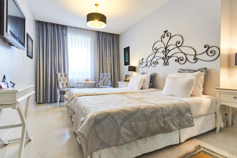 Premium bedding, down comforters, Select Comfort beds, minibar