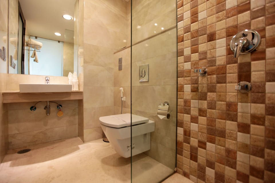 Shower, designer toiletries, hair dryer, bathrobes