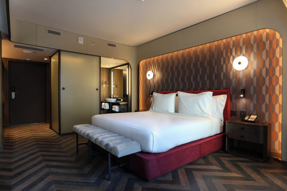 Egyptian cotton sheets, premium bedding, down comforters, minibar