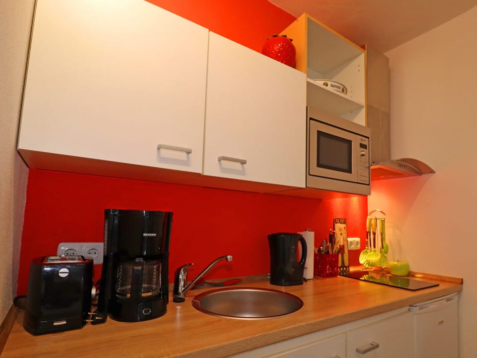 Apartment | Private kitchen | Electric kettle, highchair