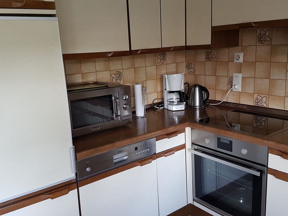 Apartment | Private kitchen | Microwave, stovetop, dishwasher, highchair