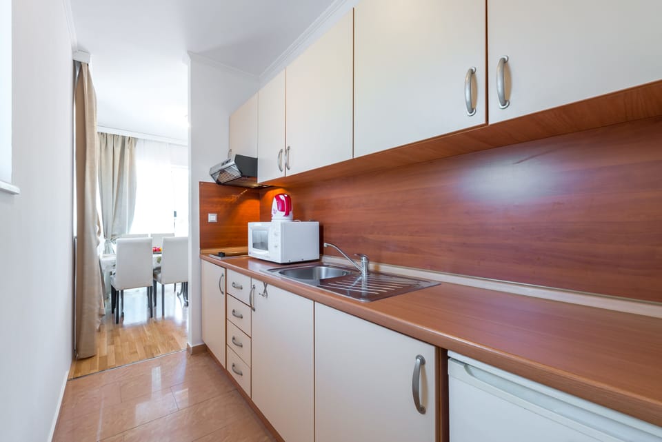 Standard Apartment, Kitchen | Private kitchen | Fridge