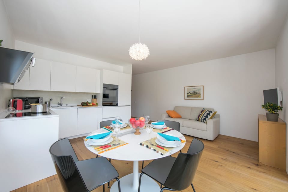 Family Apartment, 2 Bedrooms, Microwave (Charm apartment - Ascona) | Living area | 22-inch TV with cable channels