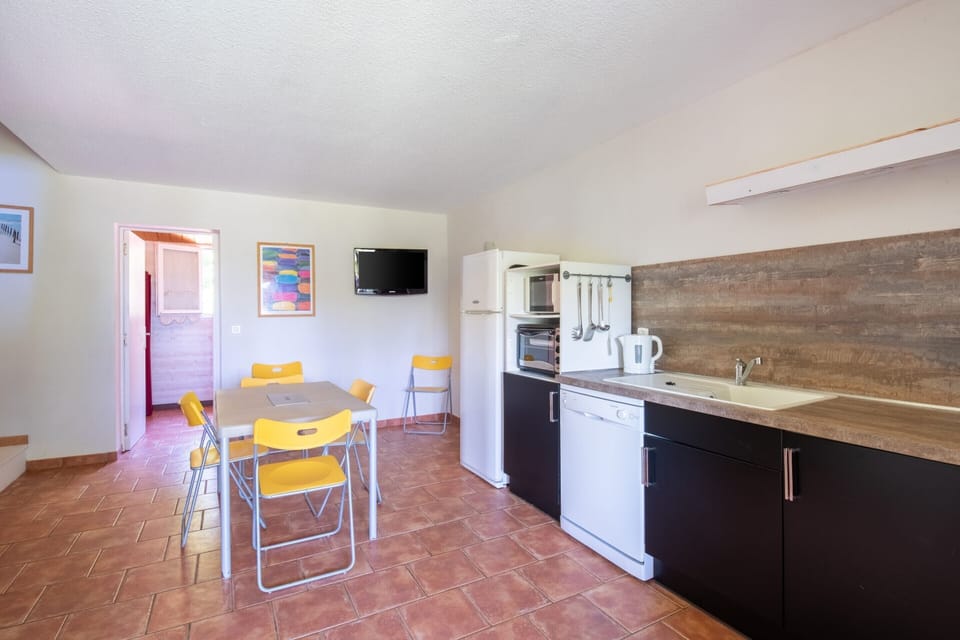 Villa | Private kitchen | Microwave, highchair