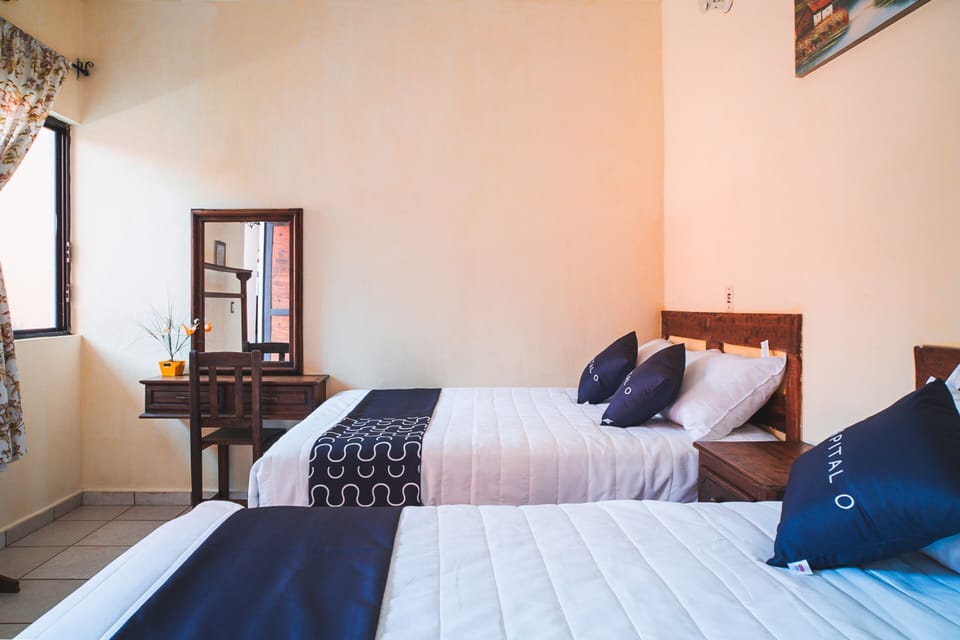 Standard Room, 2 Double Beds | WiFi (free), bed sheets