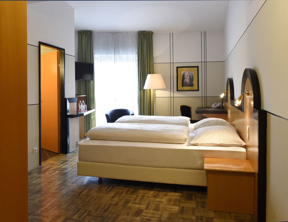Standard Double Room, 1 Double Bed | Minibar, in-room safe, desk, laptop workspace