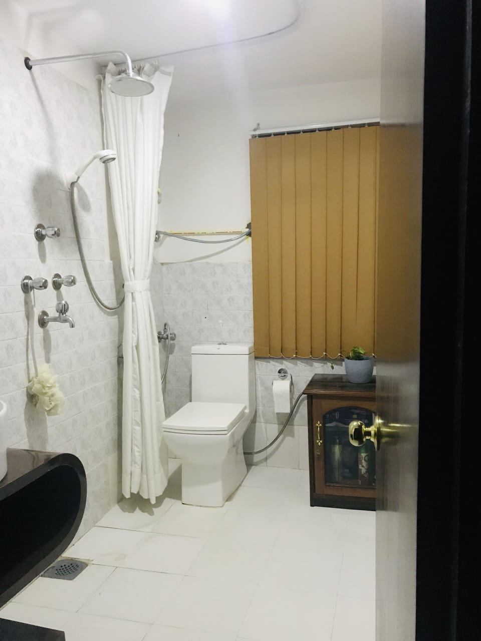 Shower, free toiletries, hair dryer, slippers
