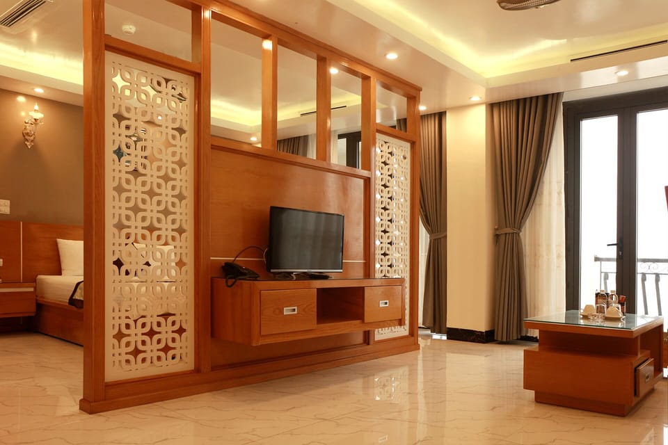 Deluxe Double Room, Beachfront | Living area | 32-inch flat-screen TV with cable channels, TV