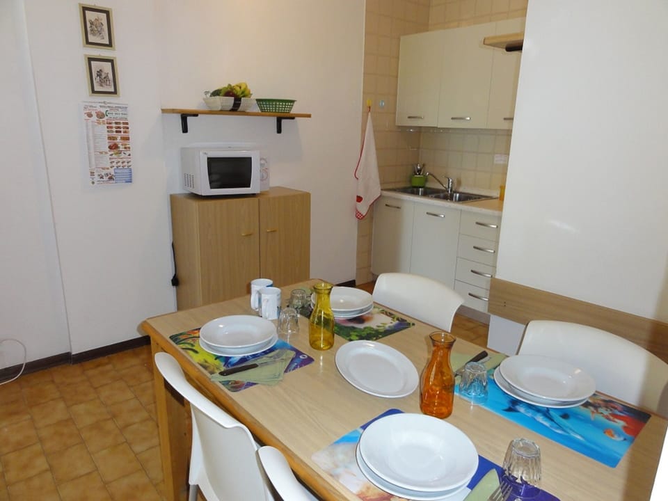 Apartment, 2 Bedrooms (A80011) | Private kitchenette | Full-size fridge, microwave, stovetop, cookware/dishes/utensils