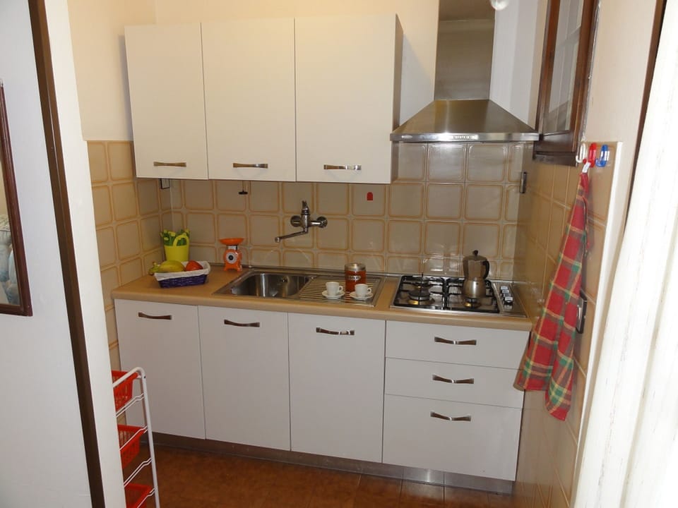 Apartment, 2 Bedrooms (B10037) | Private kitchenette | Full-size fridge, microwave, stovetop, cookware/dishes/utensils