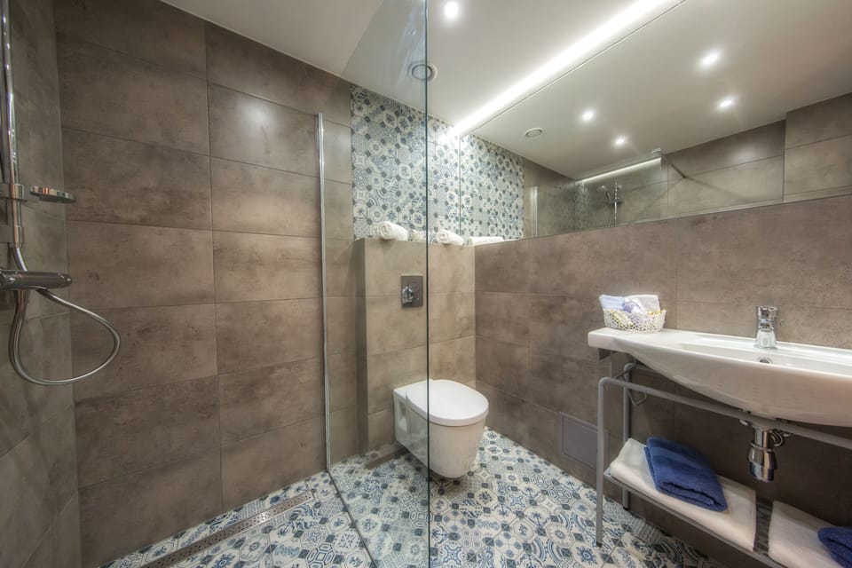 Shower, rainfall showerhead, hair dryer, bathrobes